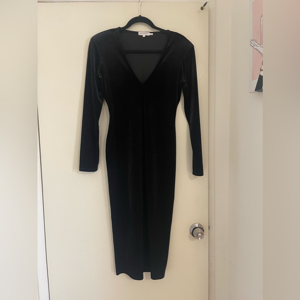 Good American black body con dress with shoulder pads
